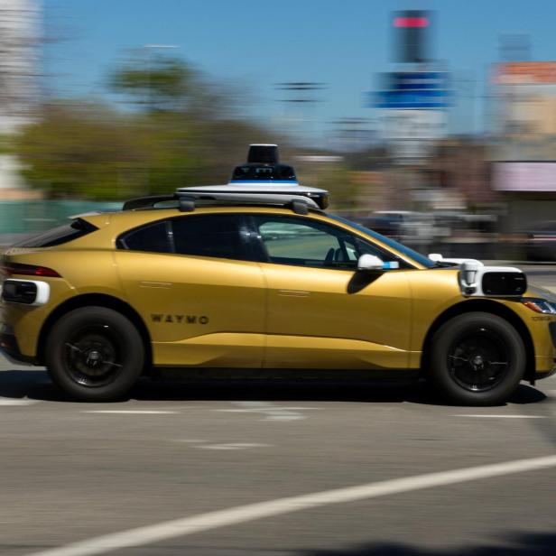 Waymo Robotaxi in Gold