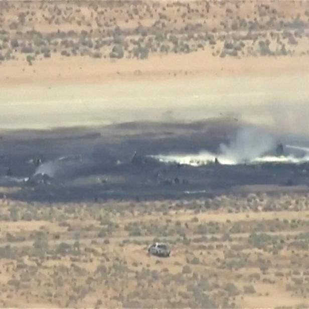 Smoke rises from Edwards Air Force Base after the crash of a U.S. Air Force B-52 bomber aircraft