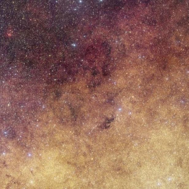Ein Sternenfeld der Milchstraße steht für das frühe Universum und den Big Bang.