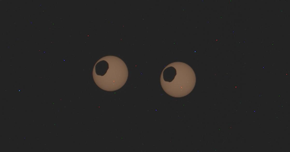 Un eclipse solar en Marte parece ojos gigantes