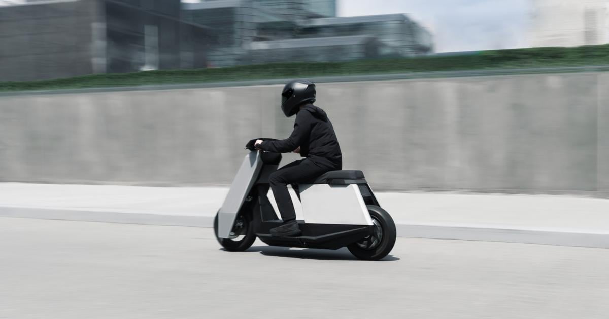The futuristic e-bike looks like a small electric truck.